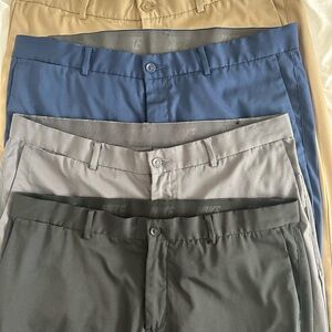 Four pairs of Nike golf dry fit standard pants size 36 x 30